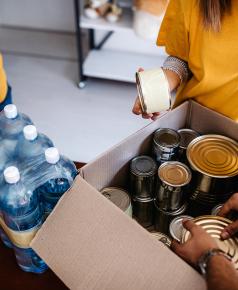 volunteers packing food boxes