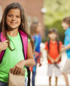 A girl with school bag